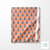 Orange and green scandi flowers fabric