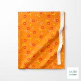 Orange, yellow and pink flowers and leaves fabric