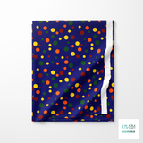 Random yellow, green and red polka dots fabric