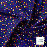 Random yellow, green and red polka dots fabric