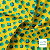 Blue and green circles and triangles fabric