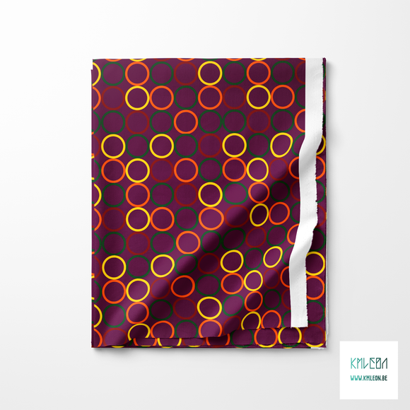 Random red, green, orange and yellow circles fabric