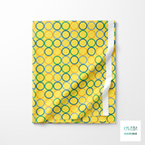 Random orange, blue and green circles fabric