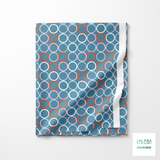 Random blue, pink, orange and white circles fabric