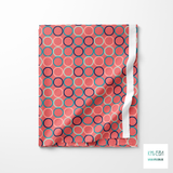 Random pink, navy, teal and mint green circles fabric