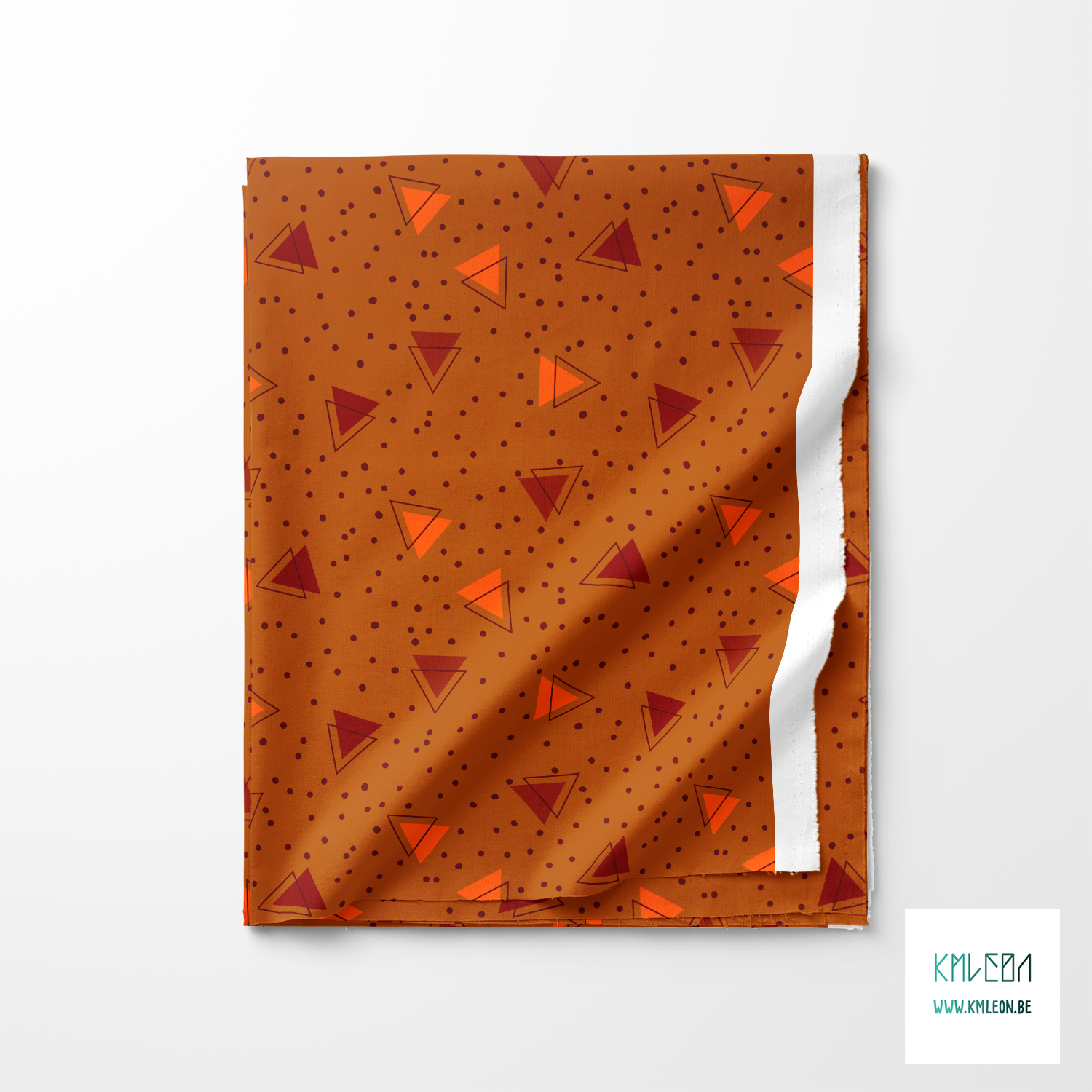 Brown and orange triangles and brown dots fabric