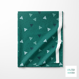 Green triangles and green dots fabric