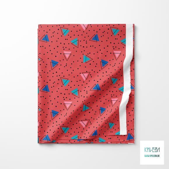 Teal, blue, pink and black triangles and black dots fabric