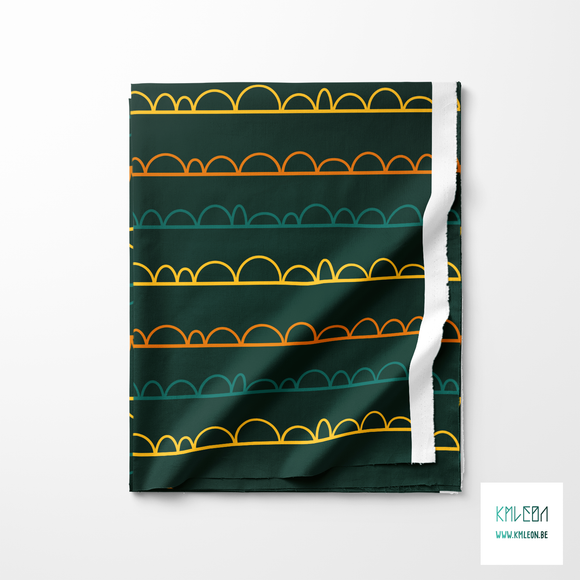 Green, yellow and orange irregular arches fabric