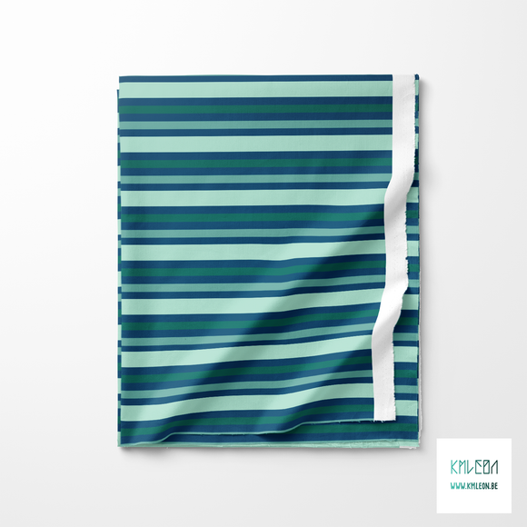 Horizontal stripes in green fabric