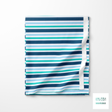 Horizontal stripes in teal, blue and navy fabric