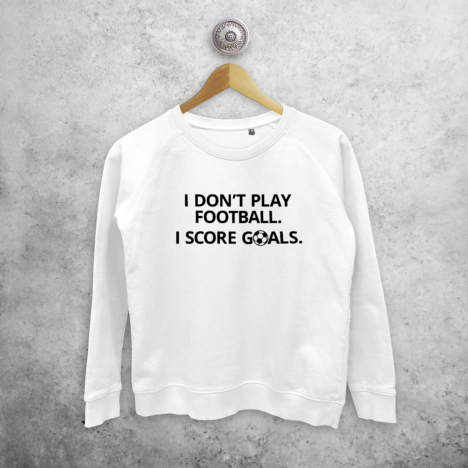 'I don't play football. I score goals.' sweater