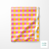 Pink and yellow gingham fabric