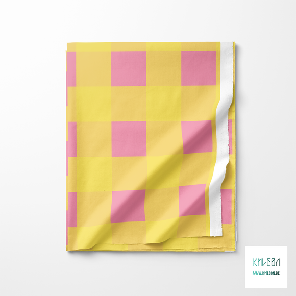 Pink and yellow gingham fabric