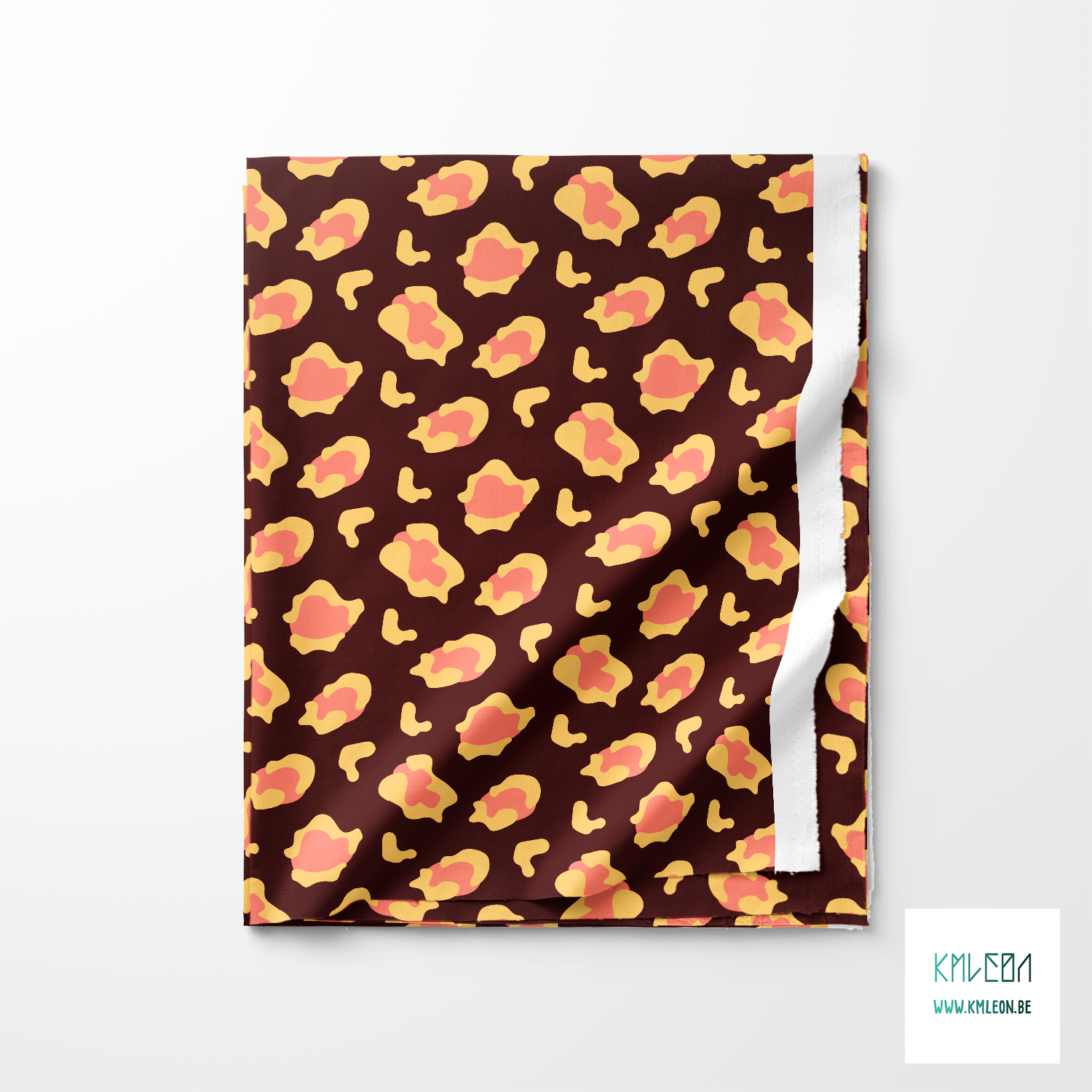 Pink and yellow leopard print fabric