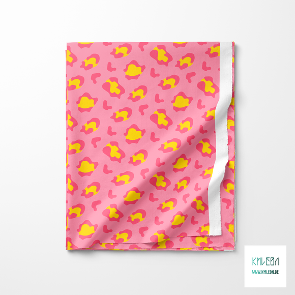 Pink and yellow leopard print fabric