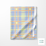 Yellow, orange and purple plaid fabric