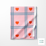 Blue plaid with orange hearts fabric