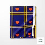 Yellow and purple plaid with orange hearts fabric