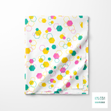 Random yellow, pink and green octagons fabric