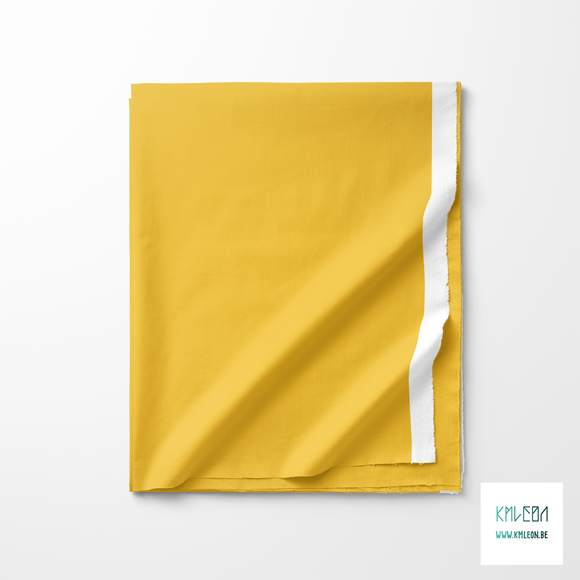 Solid saffron yellow fabric