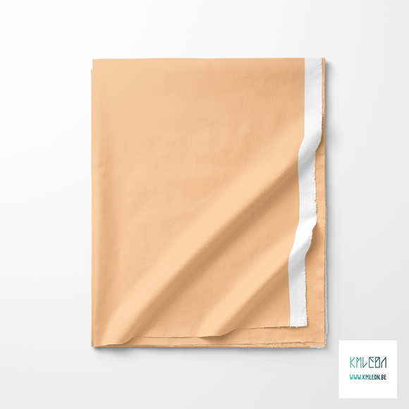 Solid soft peach fabric