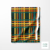 Green, orange, yellow and purple tartan fabric