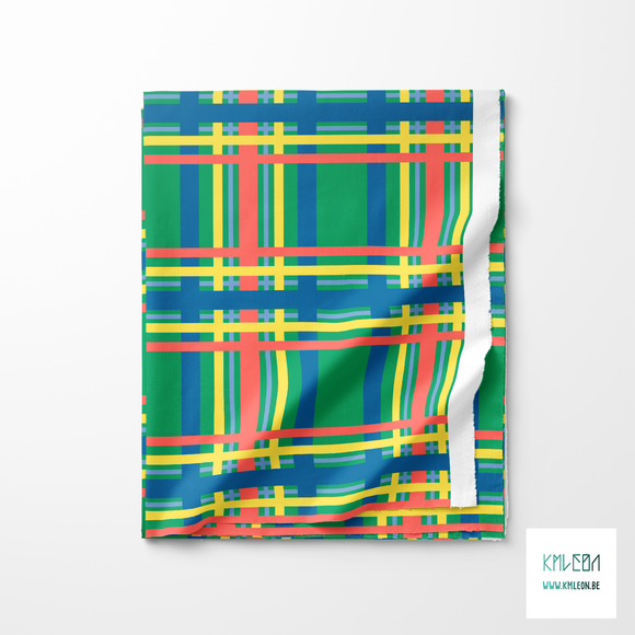 Blue, yellow and coral tartan fabric