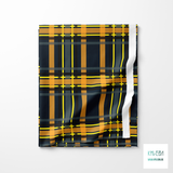 Grey, orange, yellow and black tartan fabric