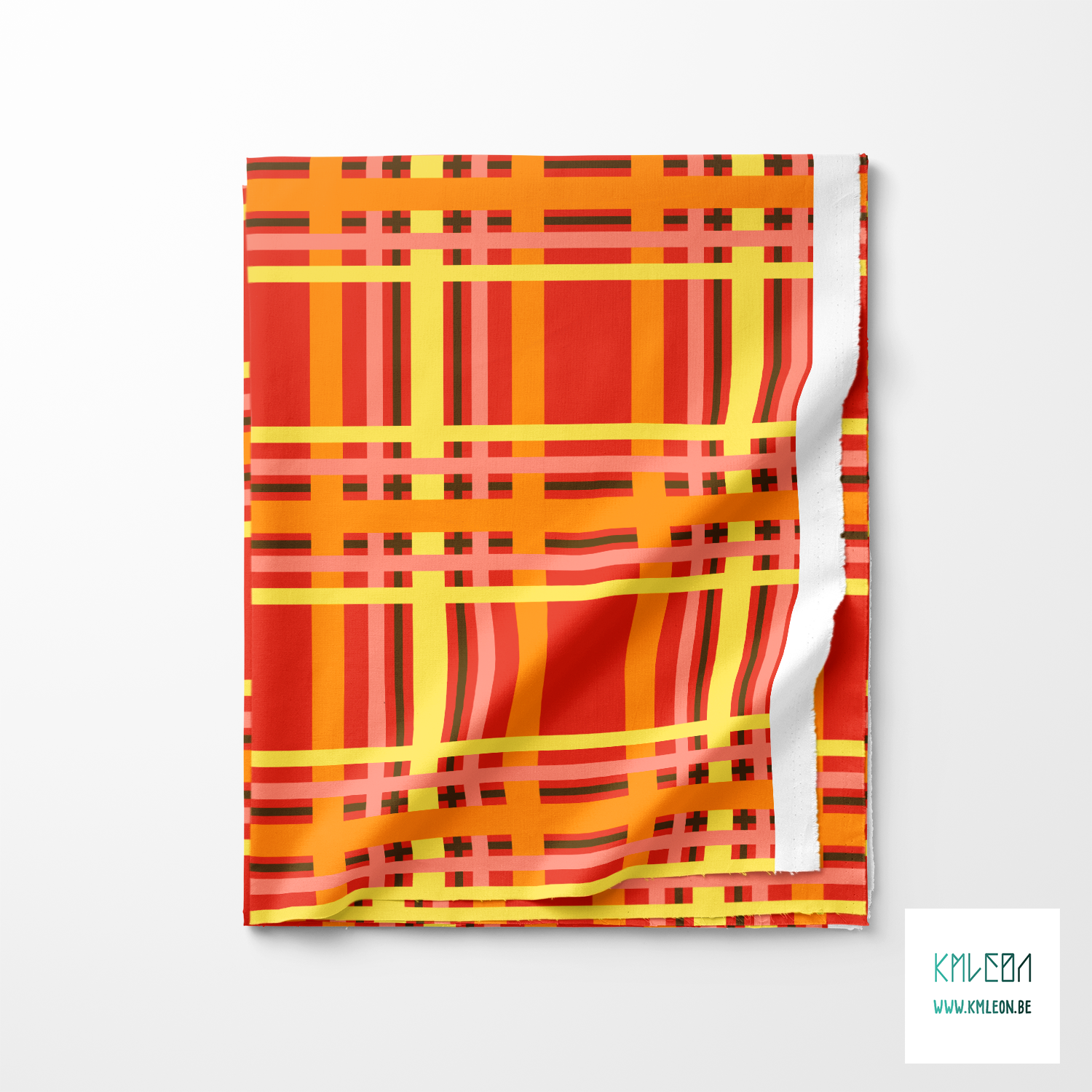 Yellow, orange, brown and pink tartan fabric