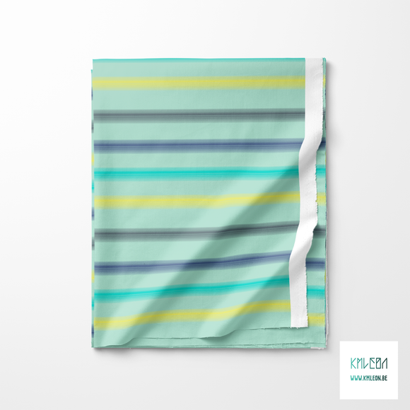 Soft horizontal stripes in yellow, blue, navy and teal fabric