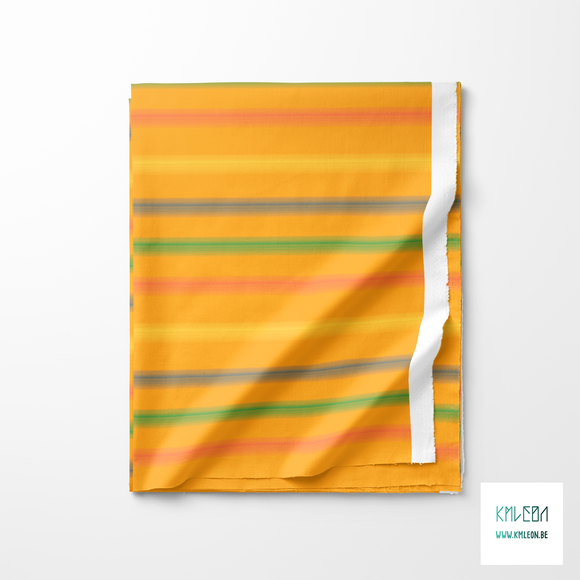 Soft horizontal stripes in green, blue, yellow and coral fabric