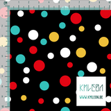 Random teal, yellow and red polka dots fabric