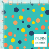 Random orange, yellow and navy polka dots fabric