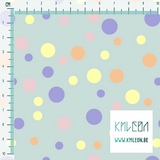 Random yellow, purple and pink polka dots fabric