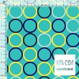 Random blue, navy, teal and yellow circles fabric