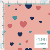 Pink, teal and navy hearts fabric