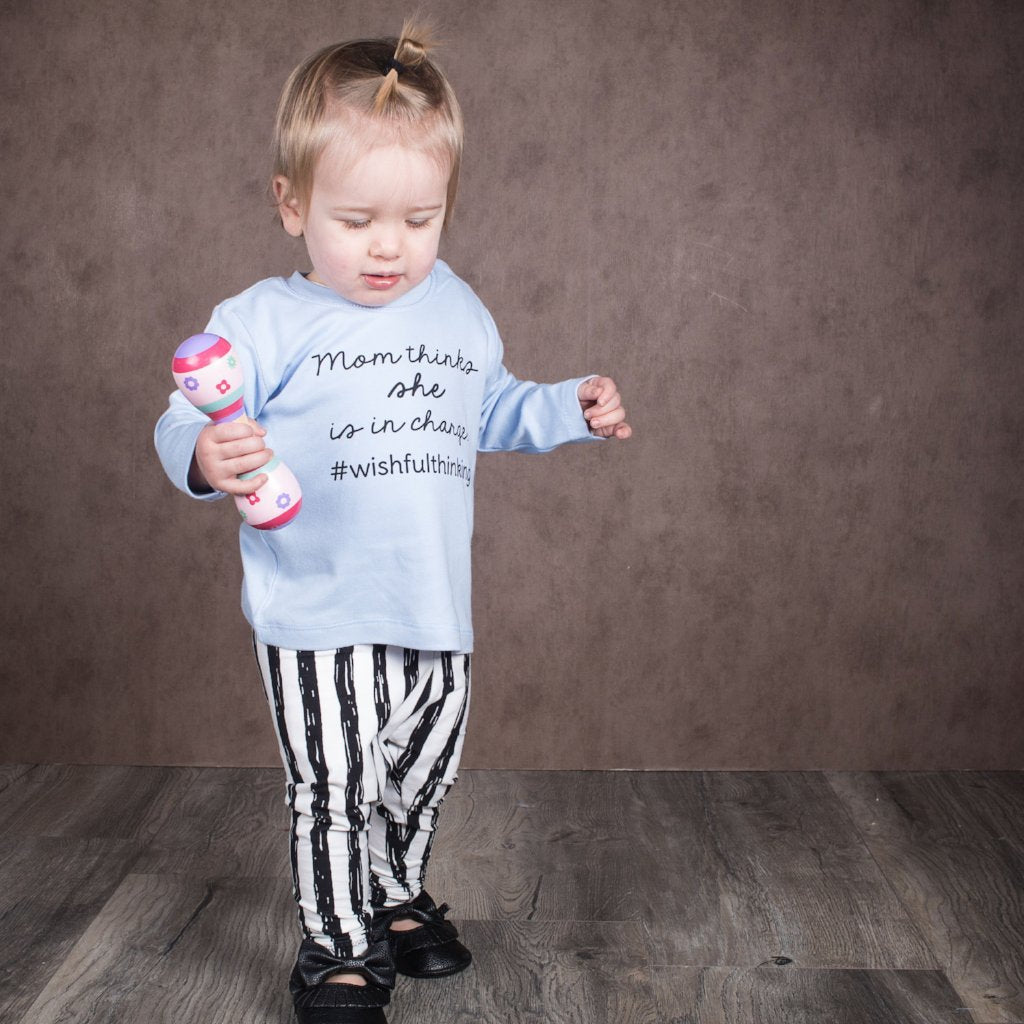 'Mom thinks she is in charge' baby longsleeve shirt