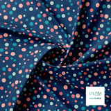 Random pink, mint green and teal polka dots fabric