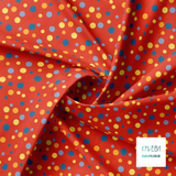 Random yellow, blue and orange polka dots fabric