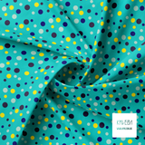 Random blue, yellow, navy and mint green polka dots fabric