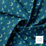 Green circles and triangles fabric