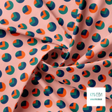 Navy, green and orange circles and triangles fabric