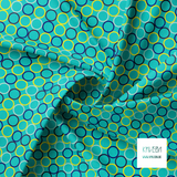 Random blue, navy, teal and yellow circles fabric