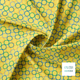 Random orange, blue and green circles fabric