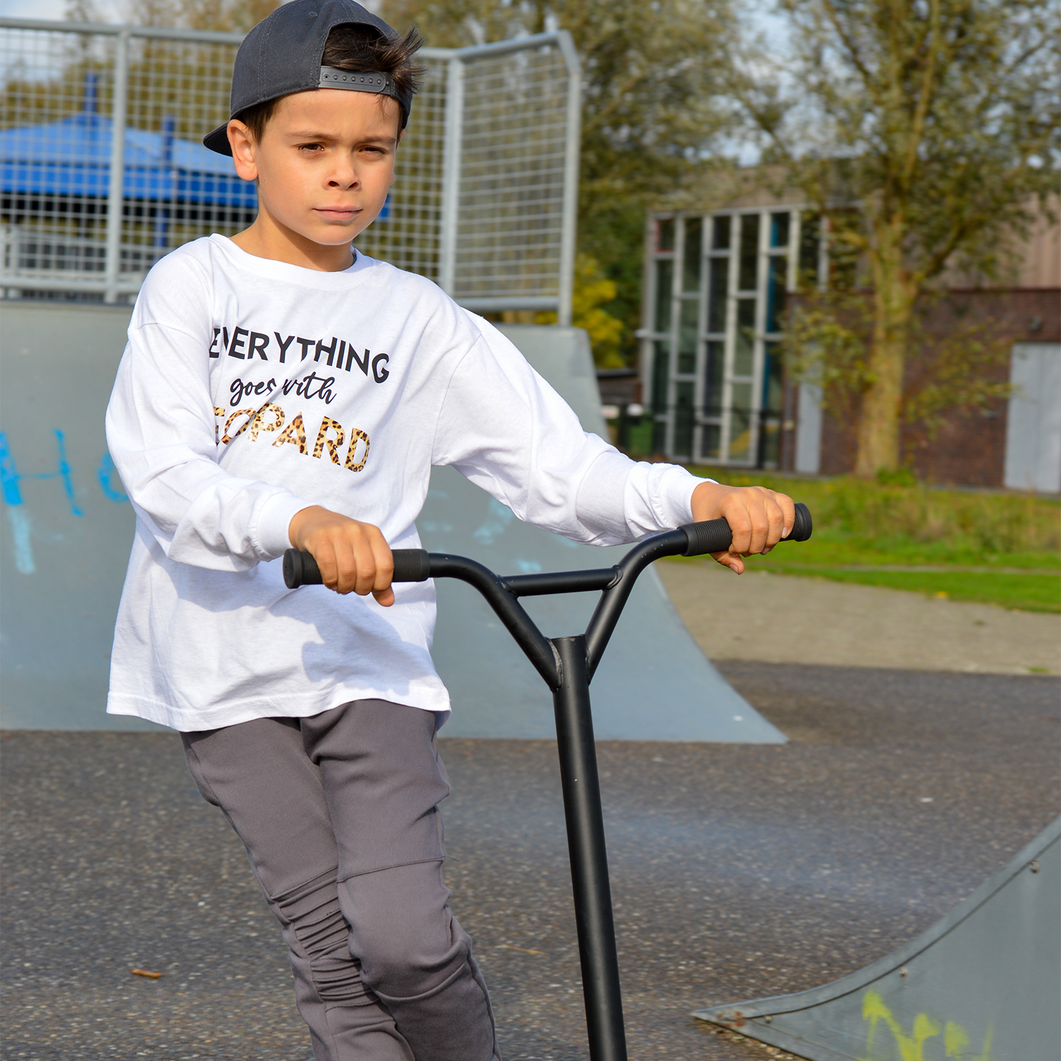 'Everything goes with leopard' kids longsleeve shirt