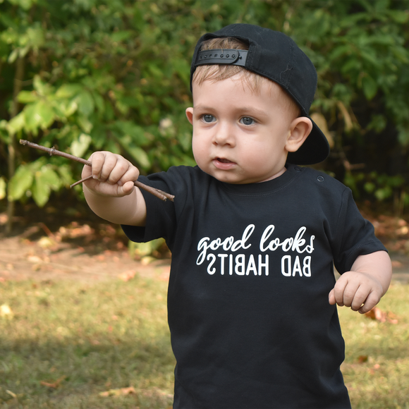 'Good looks - Bad habits' baby shortsleeve shirt