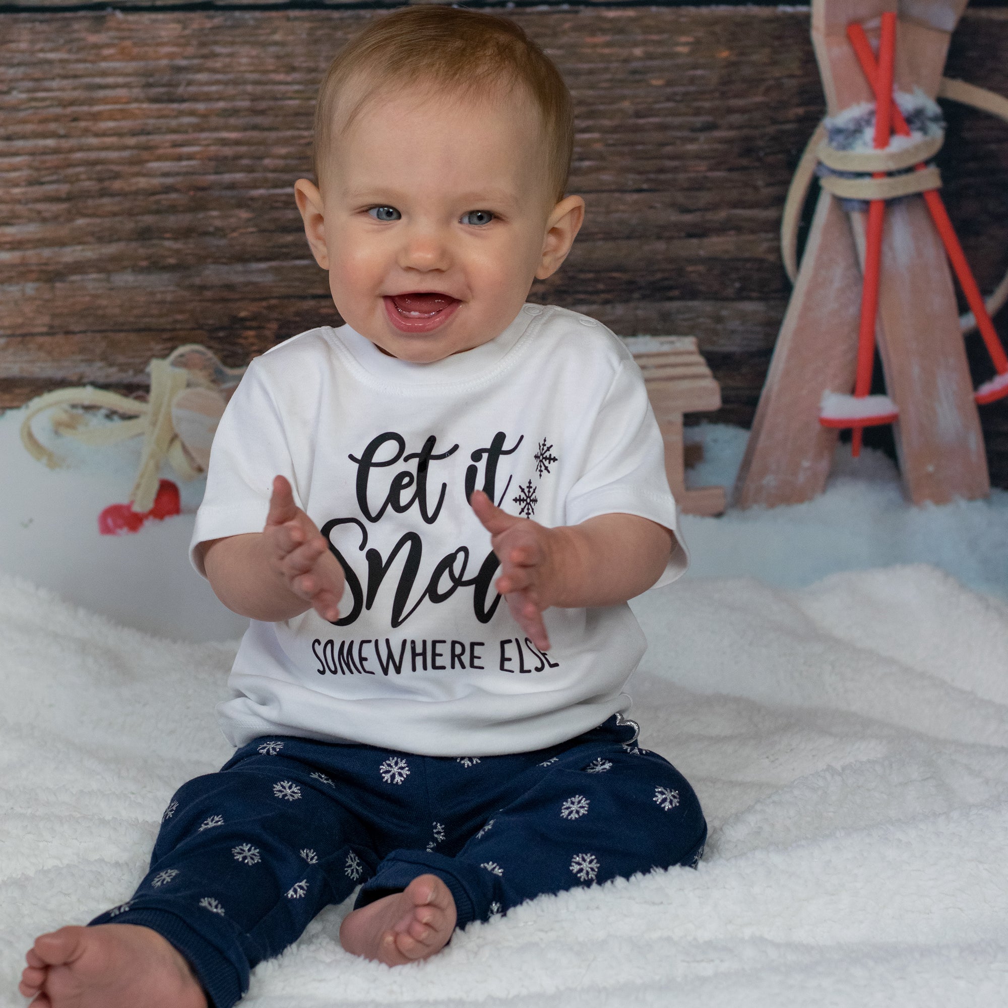 'Let it snow - somewhere else' baby shortsleeve shirt