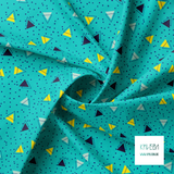 Navy, mint green and yellow triangles and blue dots fabric