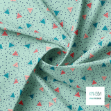 Pink, teal and navy triangles and navy dots fabric